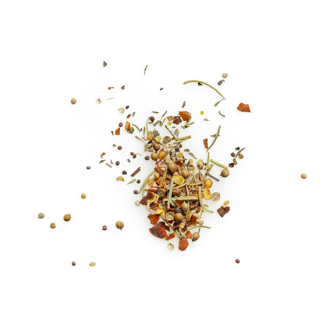 Dried herbal flowers arranged on a white surface
