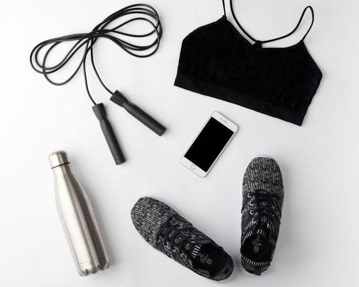Weight care: exercise essentials arranged on a white background