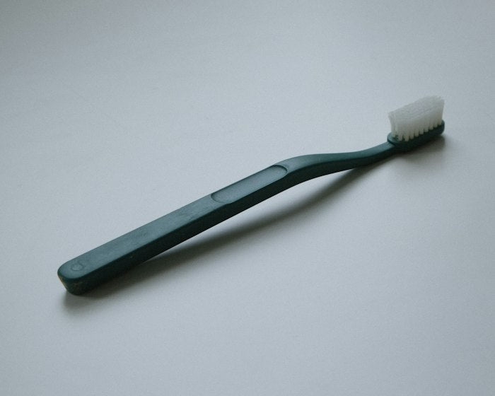 Tooth care: a toothbrush on a white background